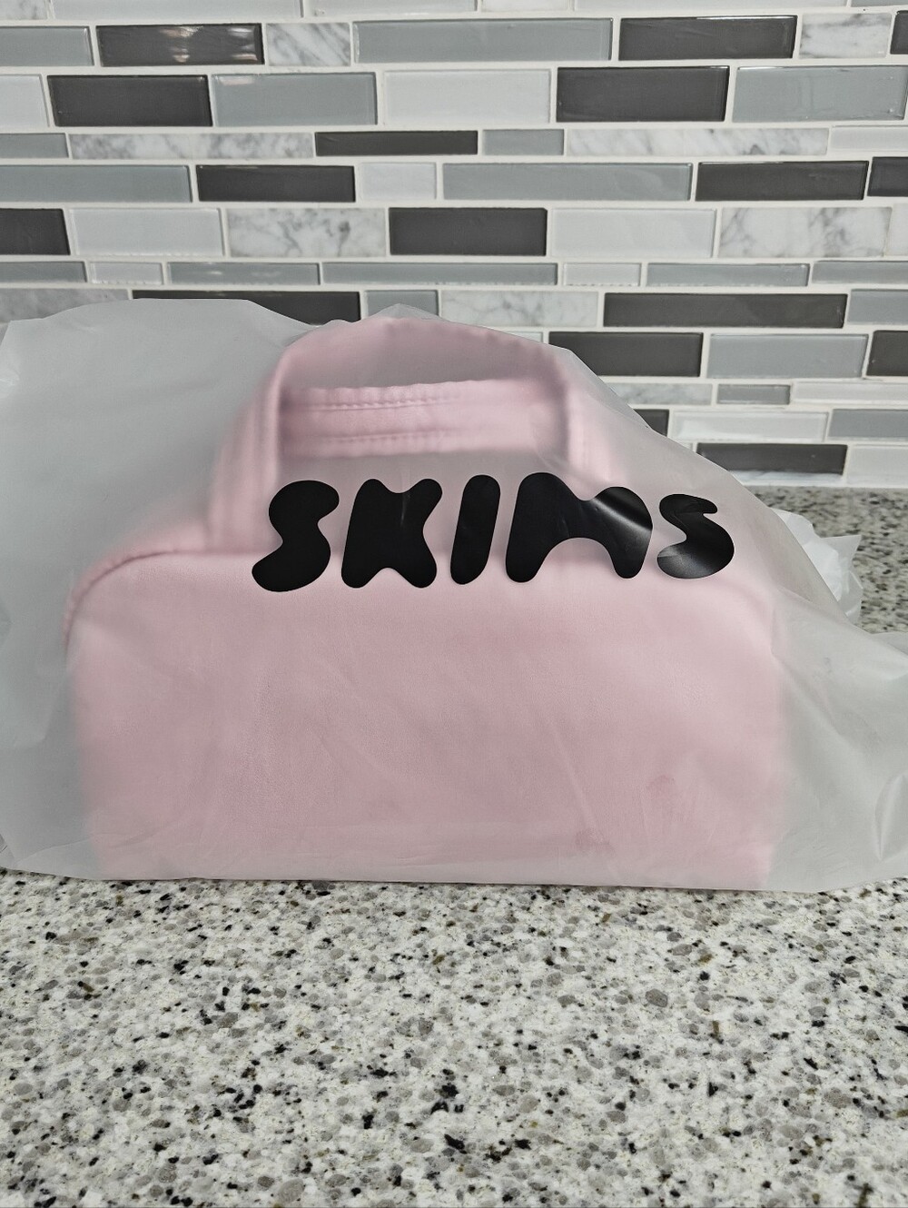 Skims Satin Mini Duffle Bag (Halite pink)